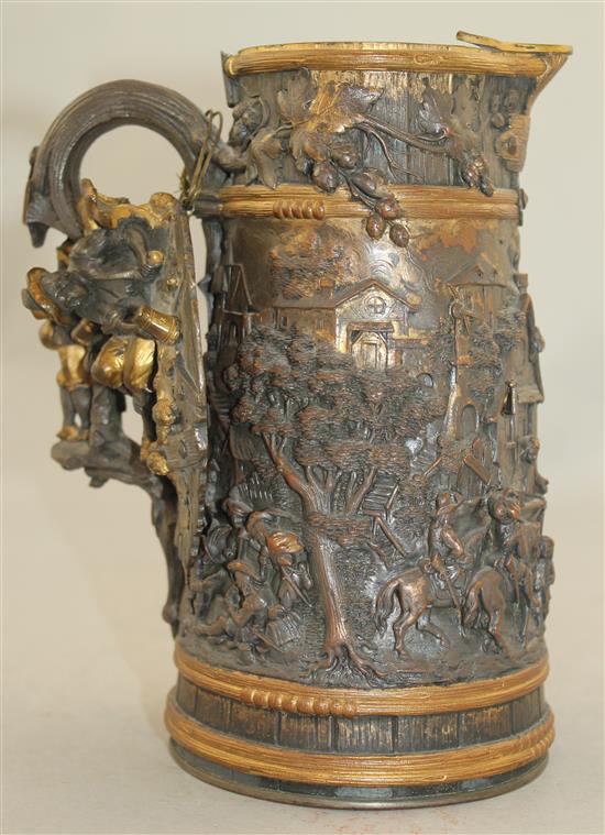 A late 19th century Dutch mixed metal tankard and oval tray, 9in.